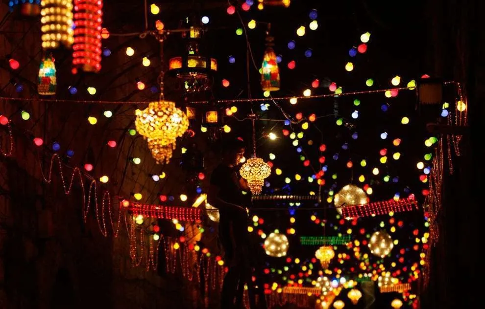 Colorful Ramadan lanterns and lights decorating an Egyptian street at night
