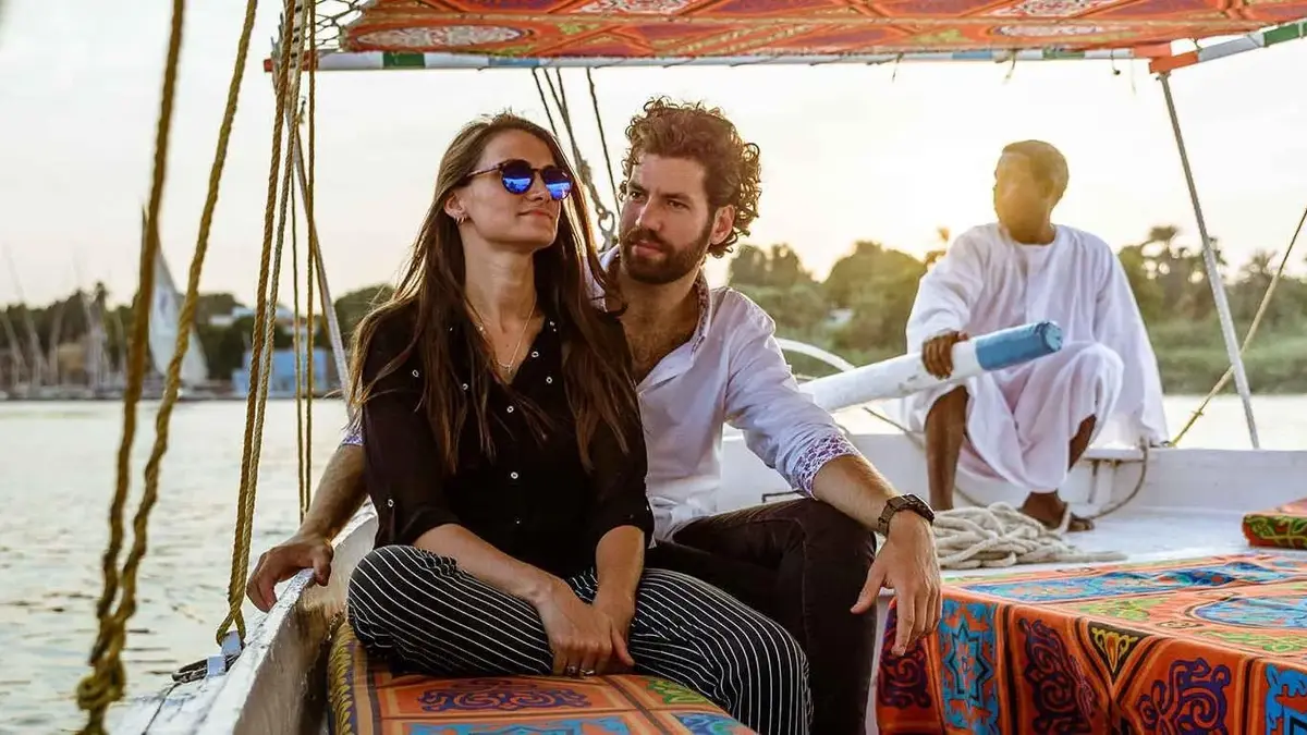 Nile cruise boat with dining tables and evening entertainment